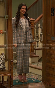 Priya's grey plaid suit on Ravens Home