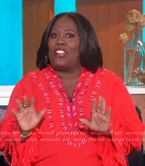Sheryl’s red embroidered blouse on The Talk