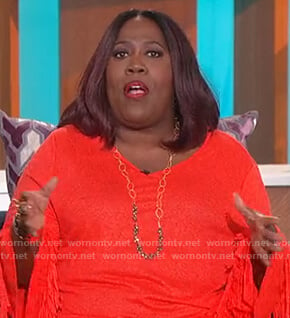 Sheryl’s red fringe sleeve top on The Talk