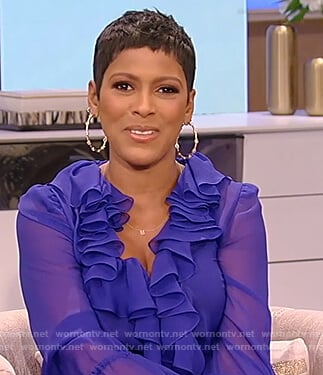 Tamron’s blue sheer ruffle dress on Tamron Hall Show