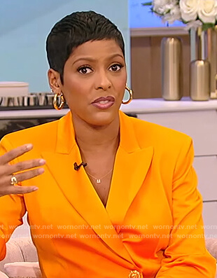 Tamron’s orange double breasted blazer on Tamron Hall Show