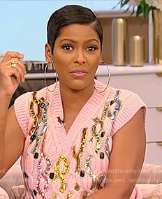 Tamron’s pink sequin embellished sweater vest on Tamron Hall Show