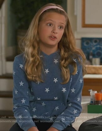 Anna's blue star print hoodie on American Housewife