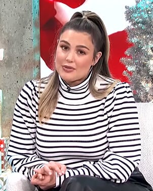 Carissa’s white striped turtleneck top on E! News Daily Pop