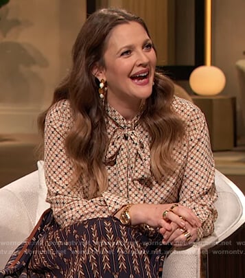 Drew’s geometric print tie neck blouse on The Drew Barrymore Show