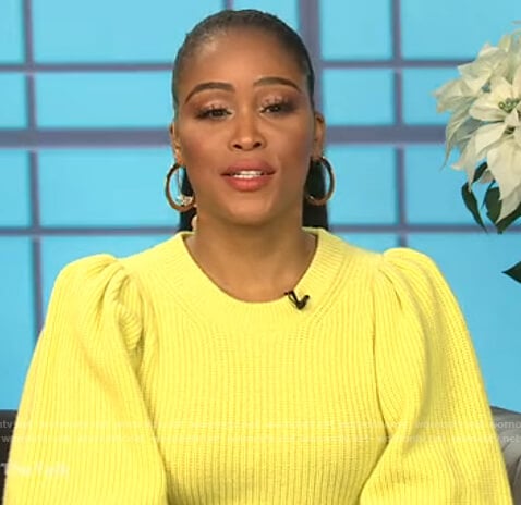 Eve’s yellow puff sleeve sweater on The Talk