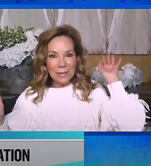 Kathie's white cable knit fringed sweater on E! News Daily Pop