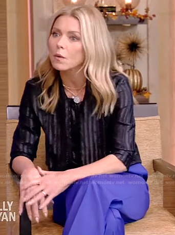 Kelly’s metallic striped blouse and blue pants on Live with Kelly and Ryan