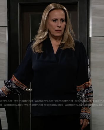 Laura’s blue embroidered wrap blouse on General Hospital