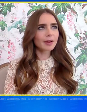 Lilly Collins’s white lace dress on E! News Daily Pop