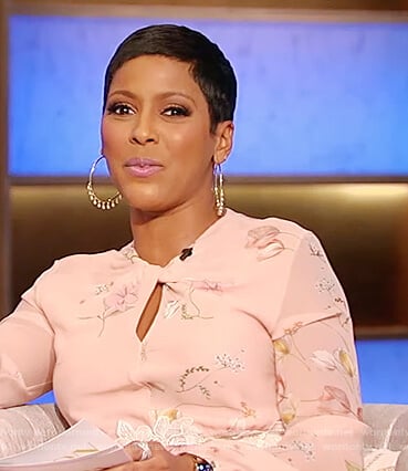 Tamron’s pink floral keyhole dress on Tamron Hall Show