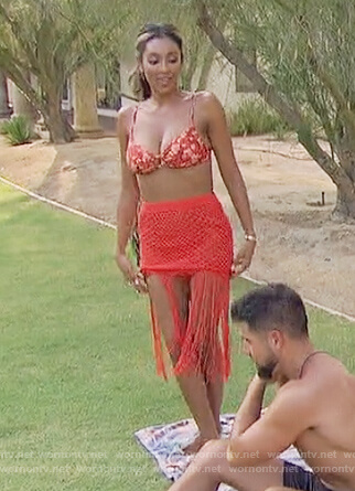 Tayshia's red floral bikini and fringe skirt on The Bachelorette
