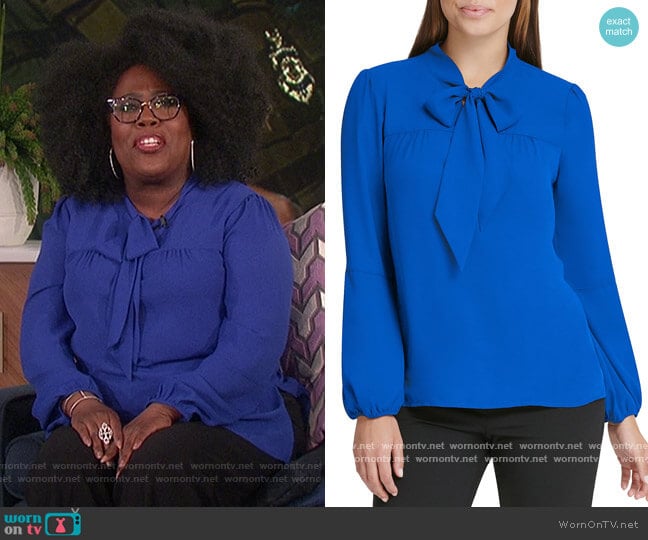 Long Puff Sleeve Tie Neck Blouse by DKNY worn by Sheryl Underwood on The Talk