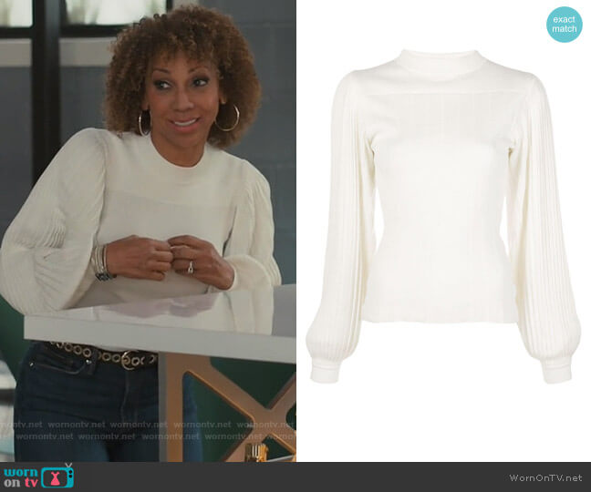 Tami’s white pleated sweater on American Housewife