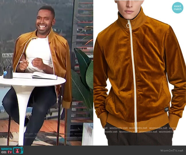 WornOnTV: Justin's gold velour bomber jacket on E! News Daily Pop