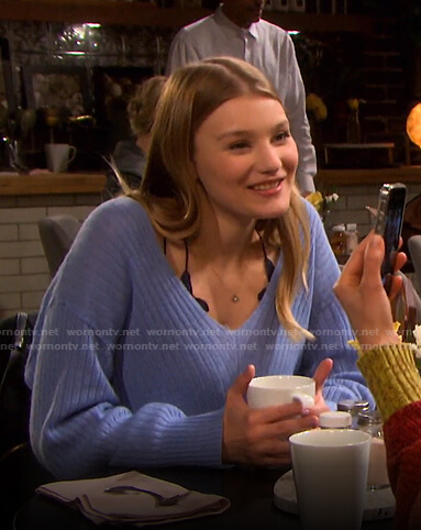 Alie's blue v-neck sweater on Days of our Lives