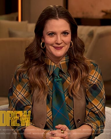 Drew’s green plaid blouse and leather skirt on The Drew Barrymore Show