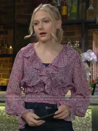 Faith’s purple floral ruffled top on The Young and the Restless