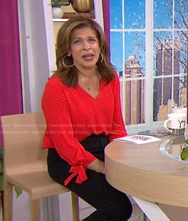 Hoda’s red tie cuff sweater on Today