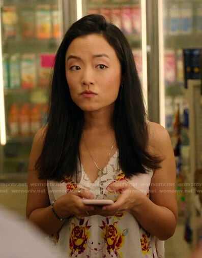 Janet's white floral lace-trim top on Kims Convenience