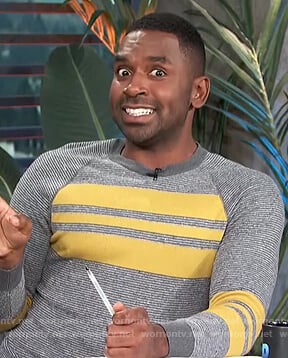 Justin’s gray and yellow stripe sweater on E! News Daily Pop