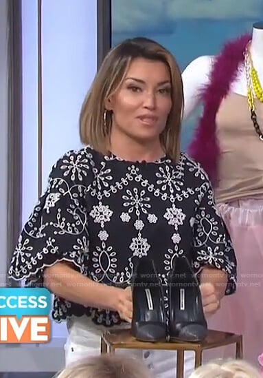 Kit's black eyelet scalloped top on Access Hollywood