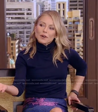 Kelly's navy turtleneck sweater and floral skirt on Live with Kelly and Ryan