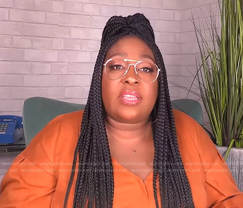 Loni’s orange suede jumpsuit on The Real