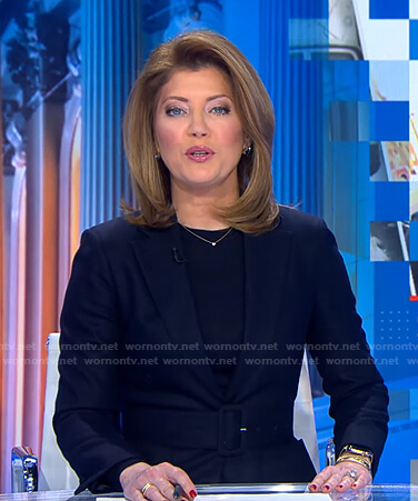 Norah’s navy belted blazer on CBS Evening News