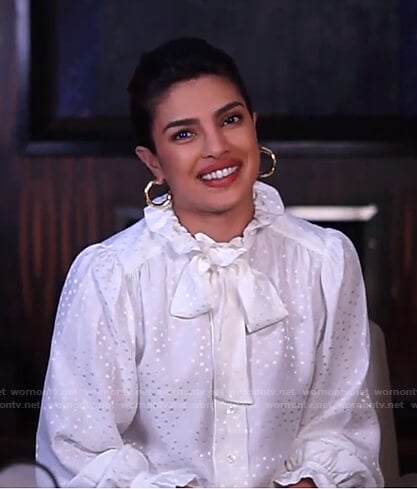 Priyanka Chopra Jonas’s white polka dot tie neck blouse on Live with Kelly and Ryan