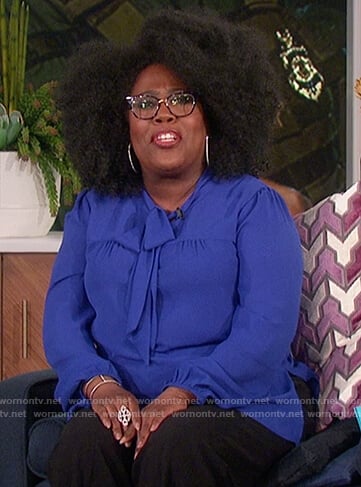 Sheryl’s blue tie neck blouse on The Talk