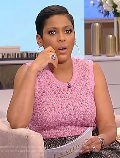 Tamron’s pink metallic knit top and pleated skirt on Tamron Hall Show