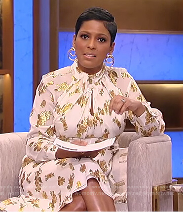 Tamron’s white metallic floral dress on Tamron Hall Show