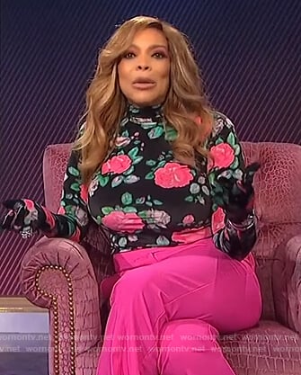 Wendy’s black floral turtleneck with gloves on The Wendy Williams Show