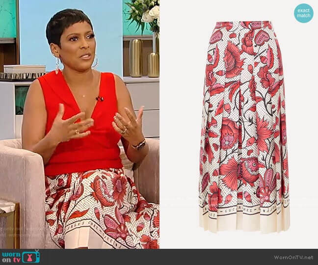 WornOnTV: Tamron's red twist front top and printed floral skirt on