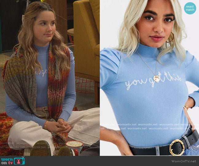 Petite puff sleeve slogan sweater in blue by River Island at ASOS worn by Lex (Jules LeBlanc) on Side Hustle