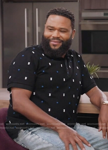 Andre’s black star embroidered polo on Black-ish