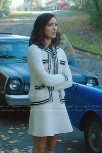 Bess's white half zip dress and knitted cardigan on Nancy Drew