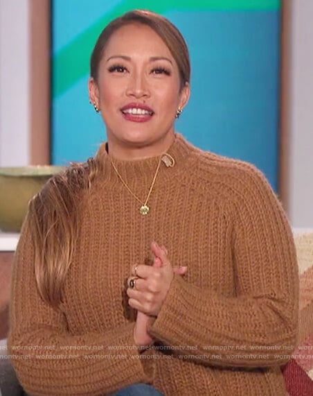 Carrie's brown knitted mock neck sweater on The Talk