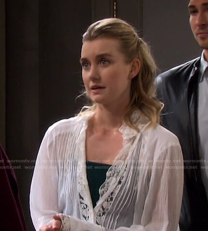 Claire’s white lace-trim blouse on Days of our Lives