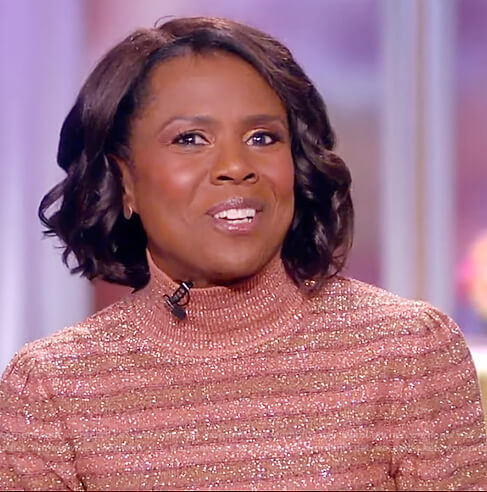 Deborah Roberts’s metallic striped turtleneck sweater on The View