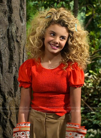 Destiny’s red smocked top and faux leather shorts on Bunkd