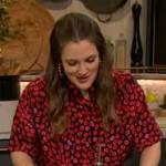 Drew’s black lip print tie neck blouse on The Drew Barrymore Show