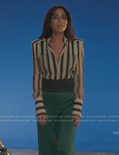 Hermione’s striped fringe blouse and green pants on Riverdale