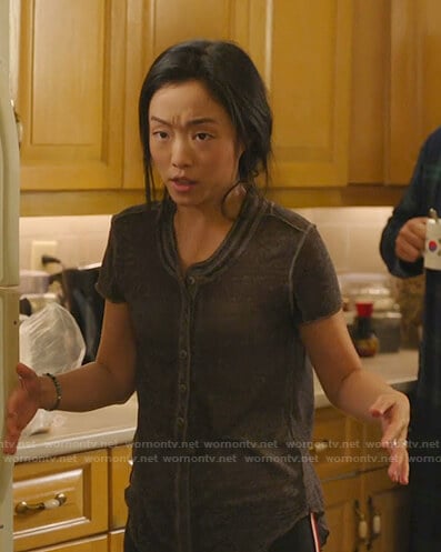 Janet's black henley tee on Kims Convenience