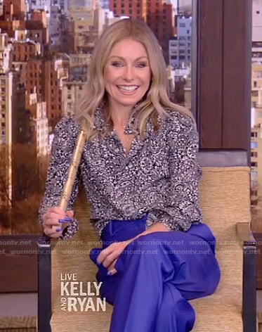 Kelly’s black paisley blouse and blue pants on Live with Kelly and Ryan