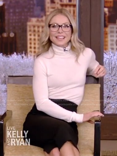 Kelly’s white turtleneck sweater and black skirt on Live with Kelly and Ryan