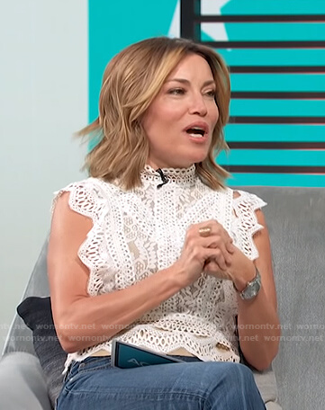 Kit’s white scalloped lace top on Access Hollywood