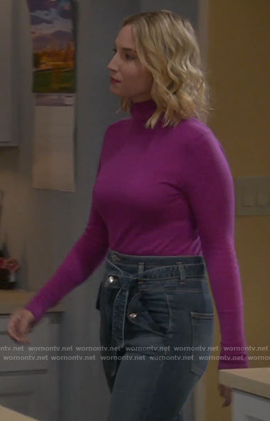 Mandy's pink turtleneck and tie waist jeans on Last Man Standing