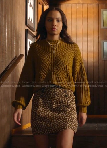 May's yellow ribbed sweater and brown floral skirt on 9-1-1